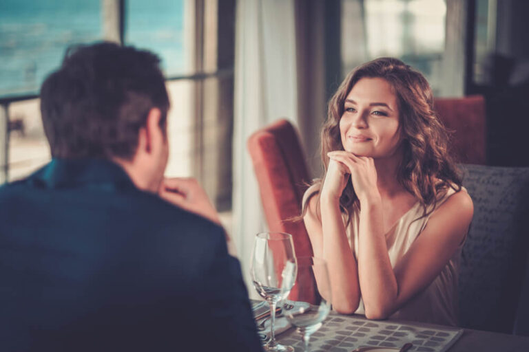 Man and woman in a restaurant for first dinner date