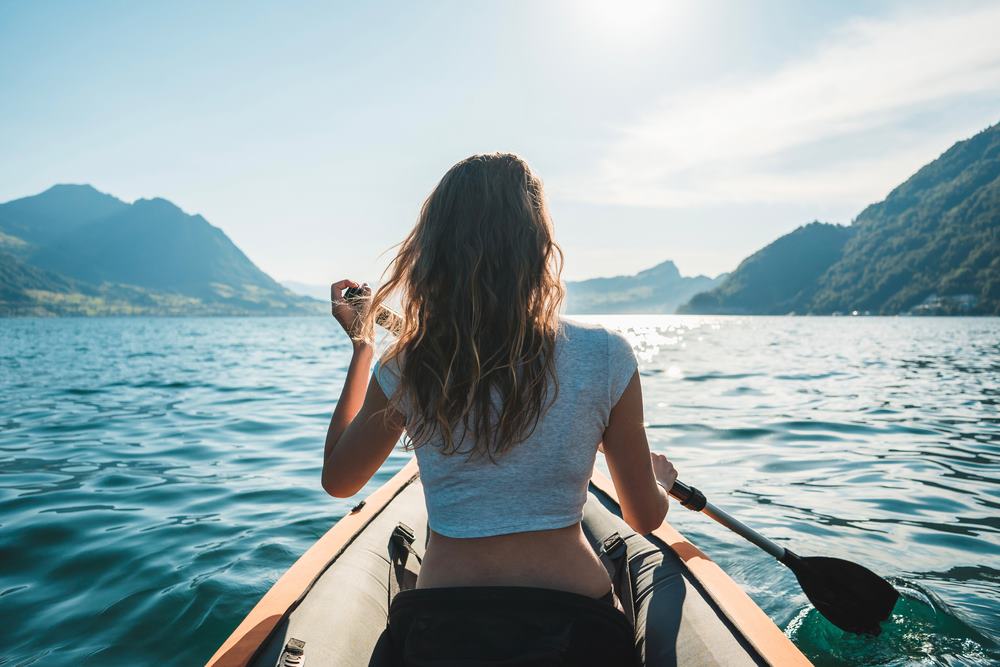 Lady is kayaking in a movie