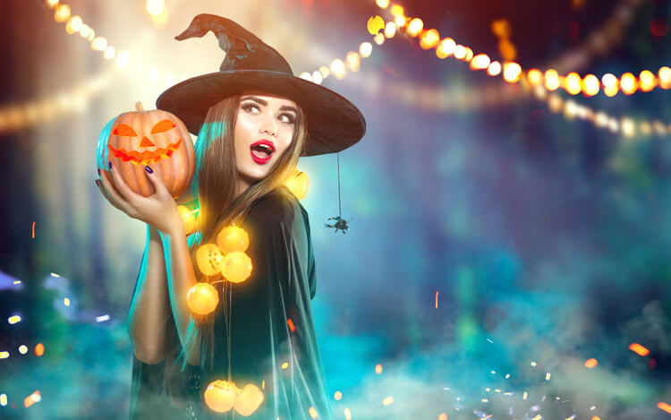 Model holding pumpkin